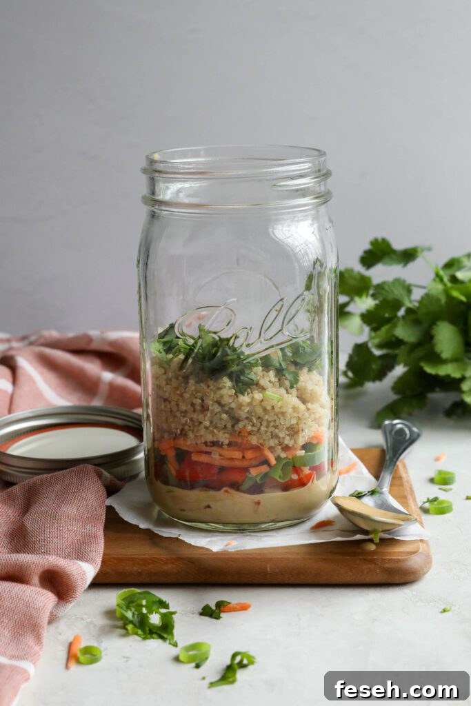 Thai Mason Jar Salad on board with cilantro in background 