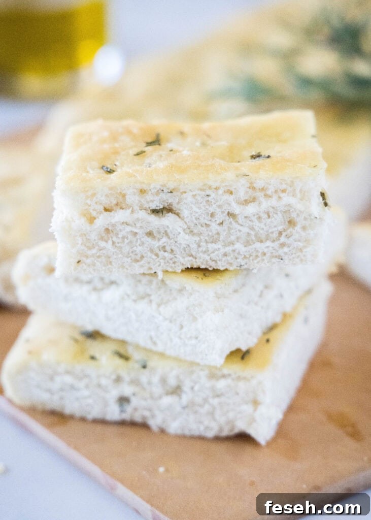 stacked focaccia bread on a cutting board