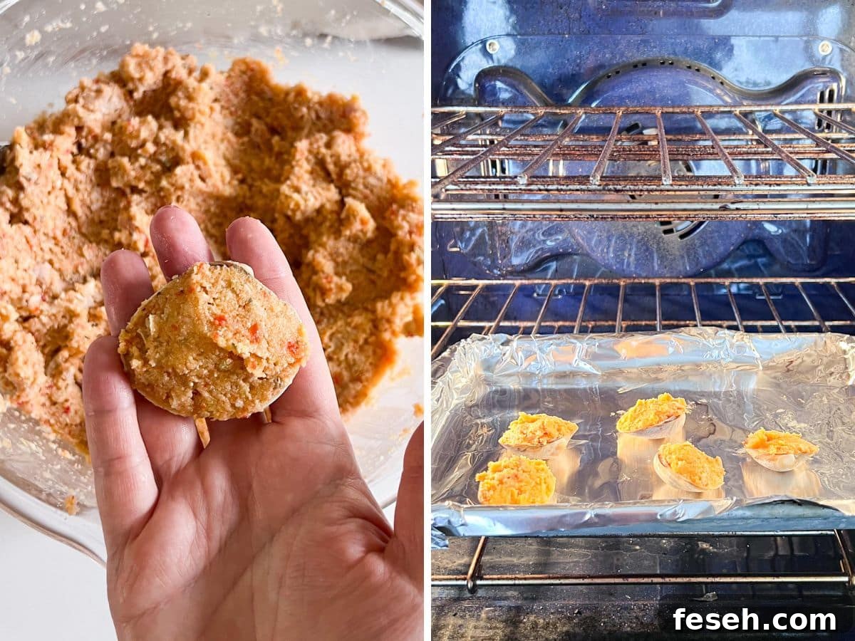 A clam shell stuffed with the filling in a hand and some stuffed clams on a foil lined sheet pan in the oven.