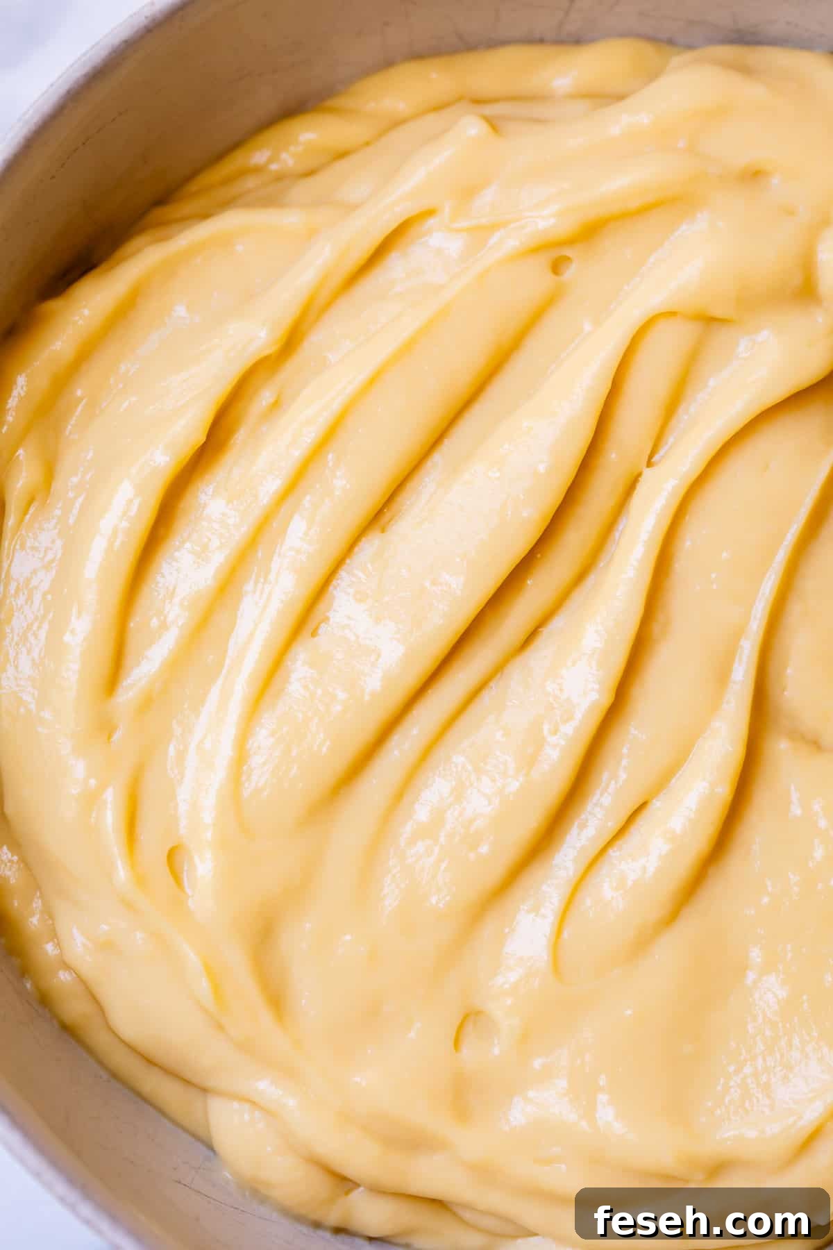 close up of pastry cream mixed with whipped cream called Crème Légère, for filling donuts.