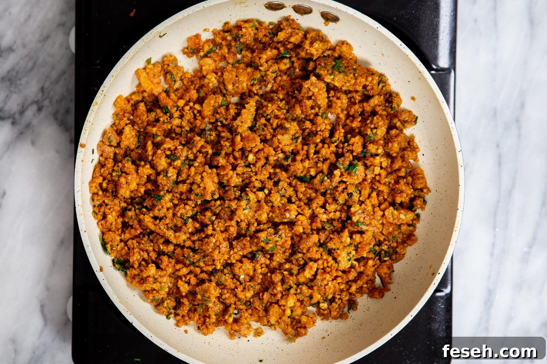 filling for vegan kachori pinwheels in a sauteeing pan 