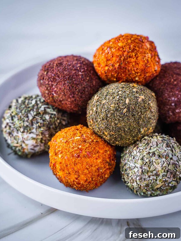 Labneh balls stacked on a plate.