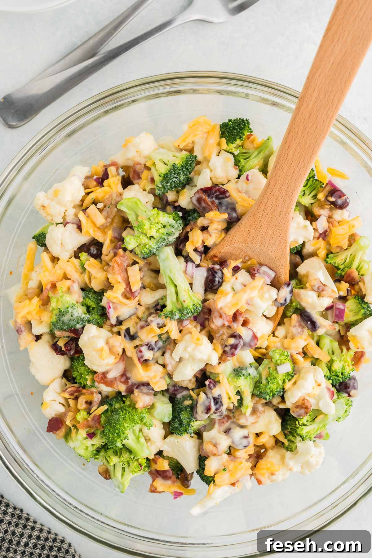 easy broccoli cauliflower salad in a bowl
