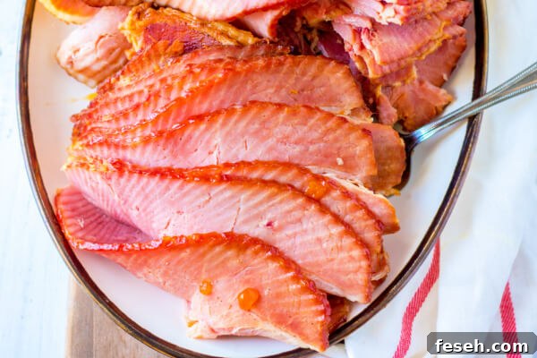 cooked spiral ham on plate