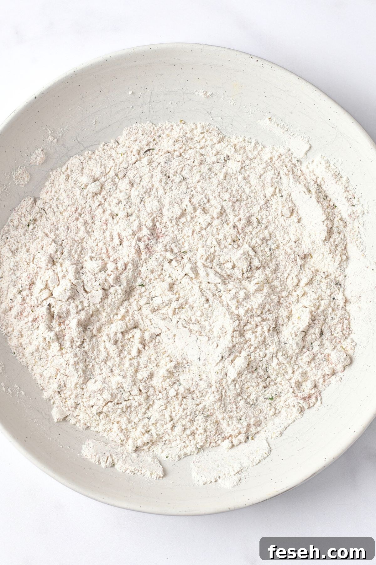 A bowl with flour mixture.