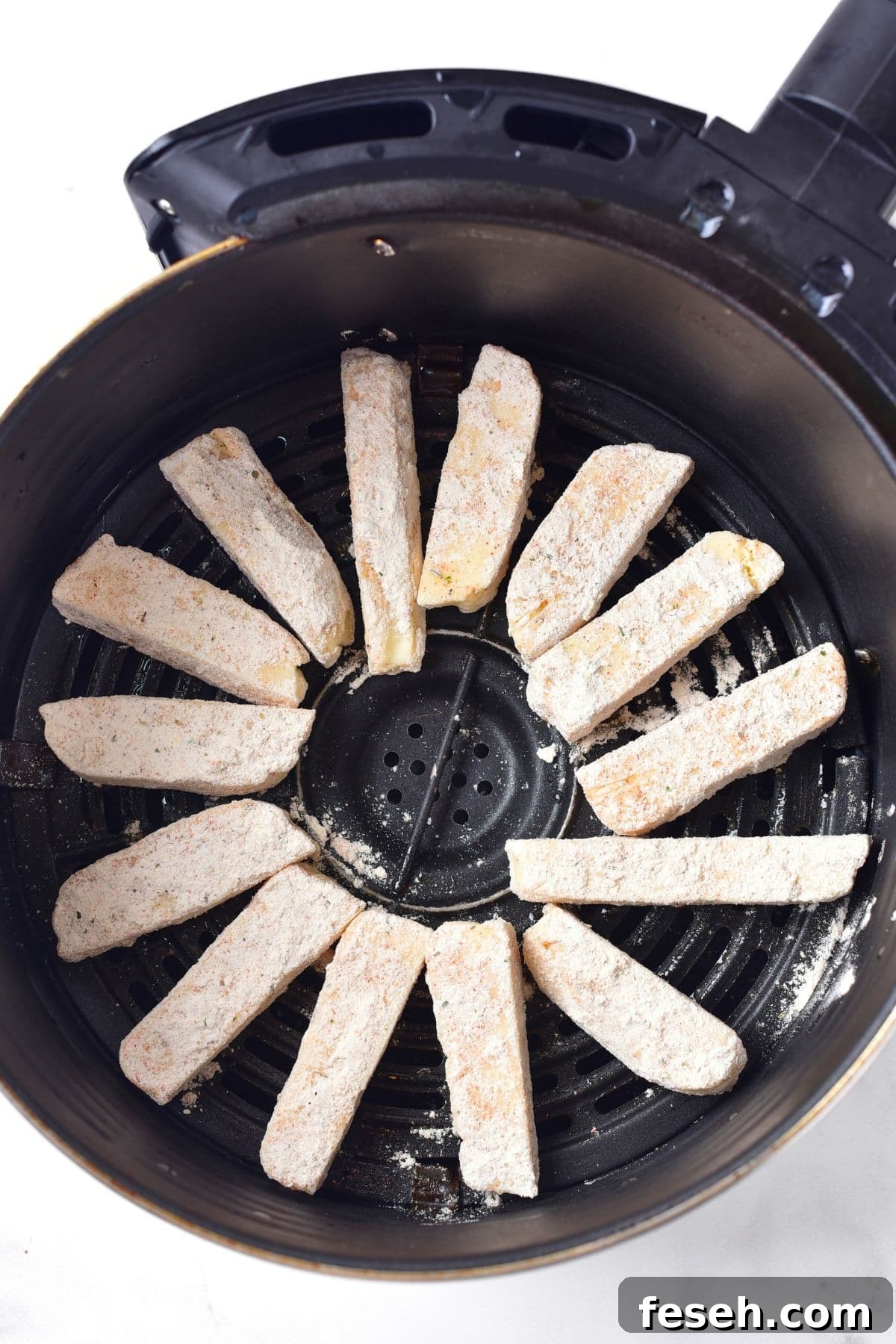Halloumi Sticks in air fryer basket