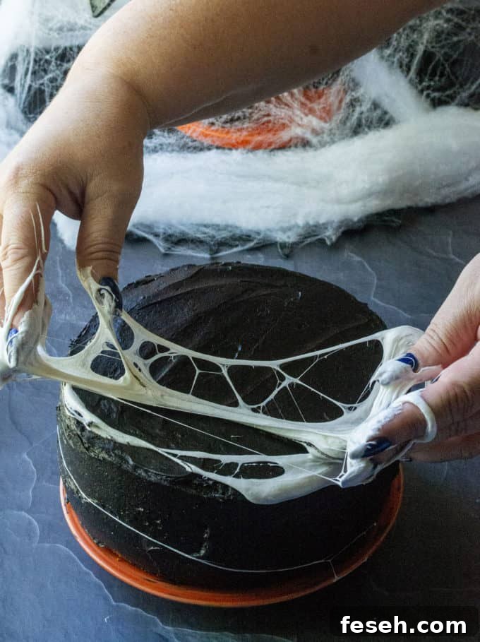 marshmallow spiderweb cake