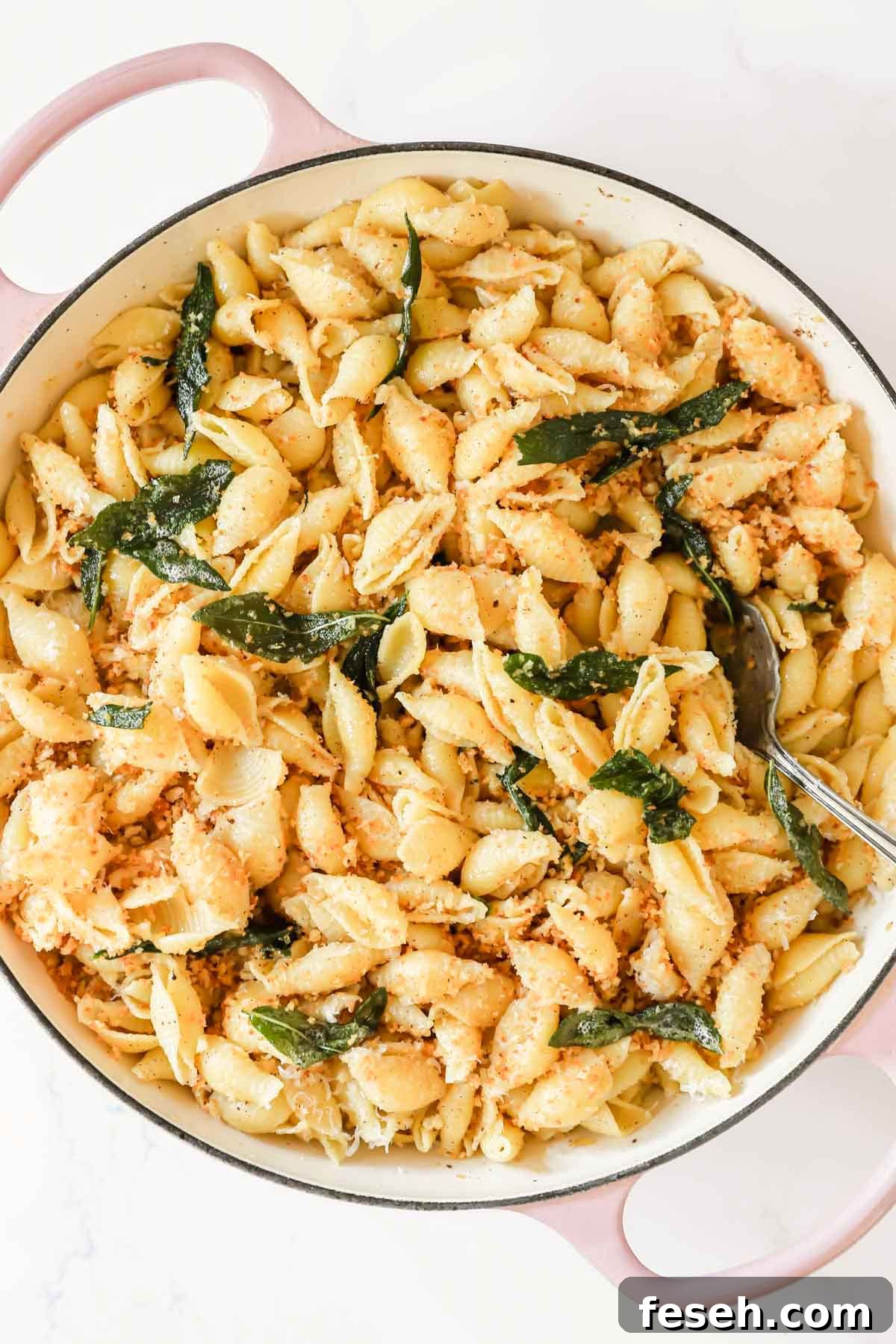 Overhead image of a large pot of brown butter pasta.