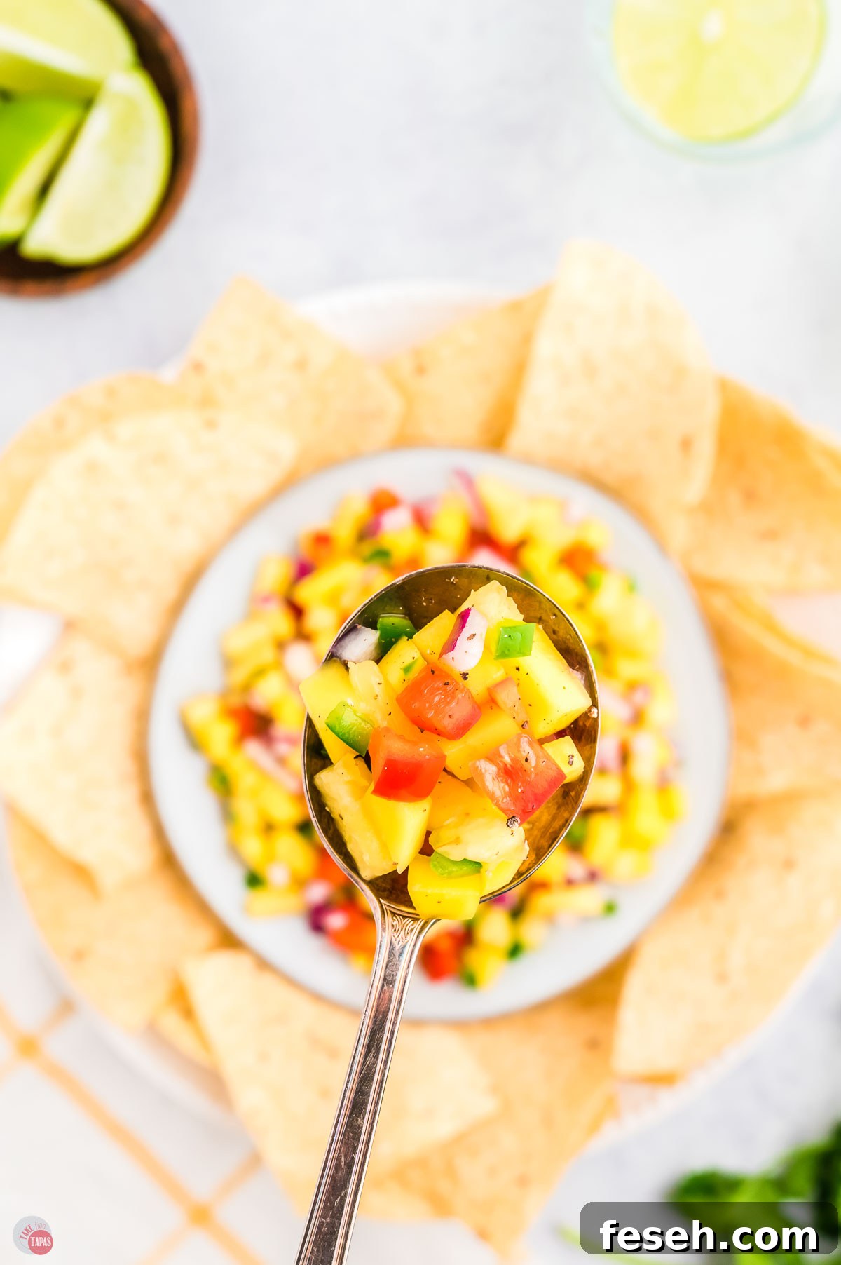 spoon of diced pineapple and pepper