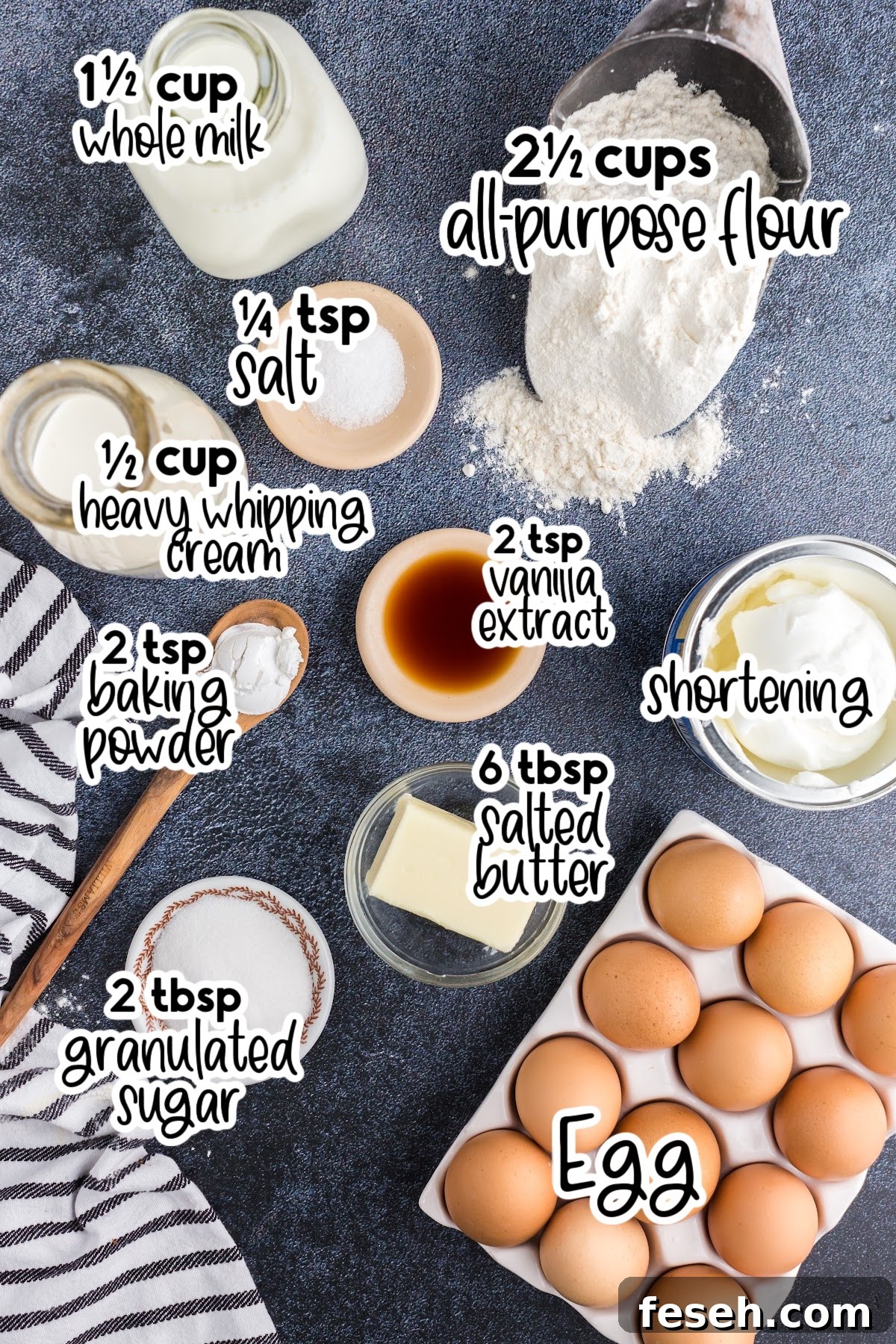Individual ingredients needed for funnel cake fries, like a scoop of flour and a jug of cream, set out with text labels.