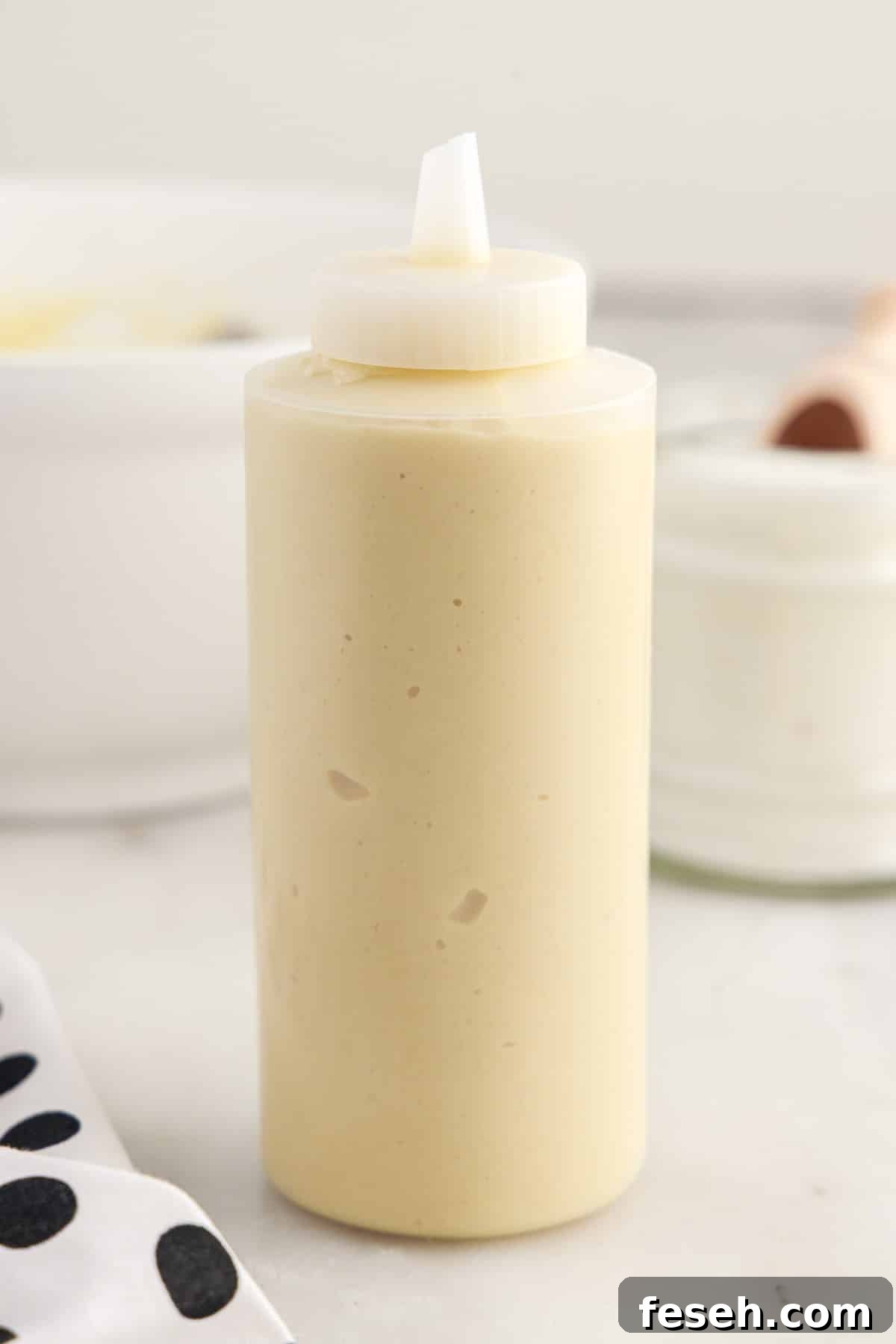 Funnel Cake Fries batter in a squeeze bottle.