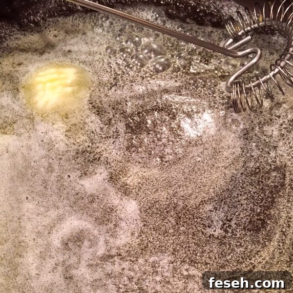 Melting butter in large skillet