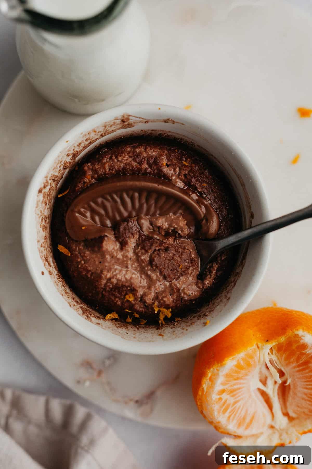 chocolate orange baked oats in a small white ramekin.