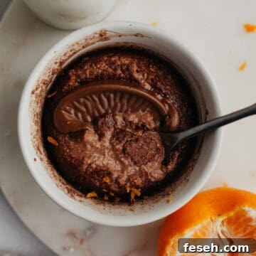 chocolate orange baked oats in a small white ramekin.
