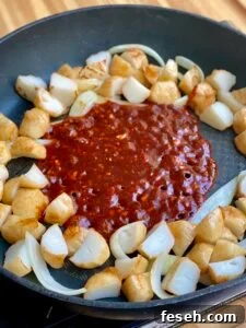 adding sauce
