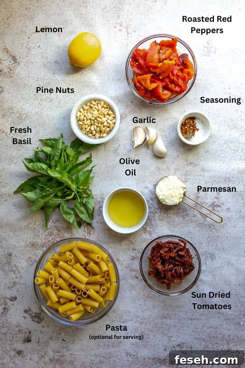 Glass bowls with ingredients in them and fresh herbs all on a counter. 