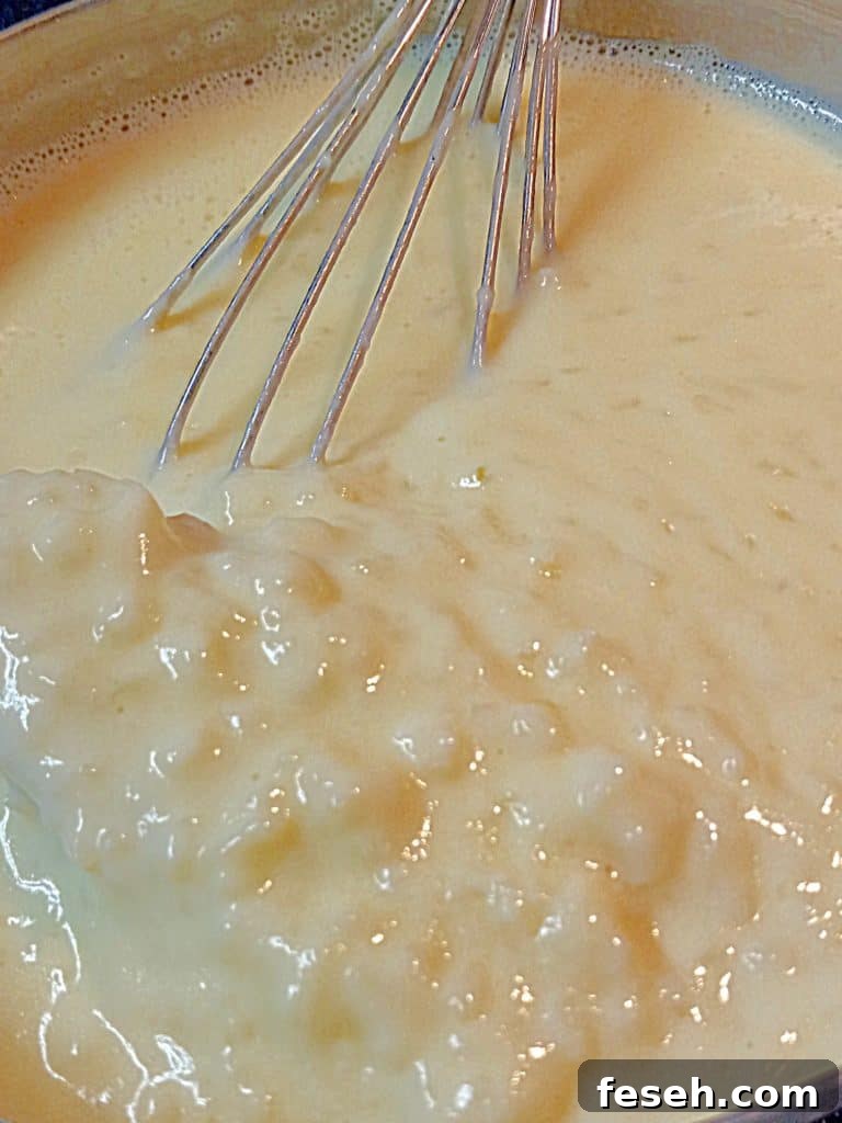 cooking creamy rice pudding.