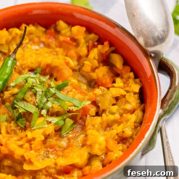 A close up image of baingan bharta in a bowl.