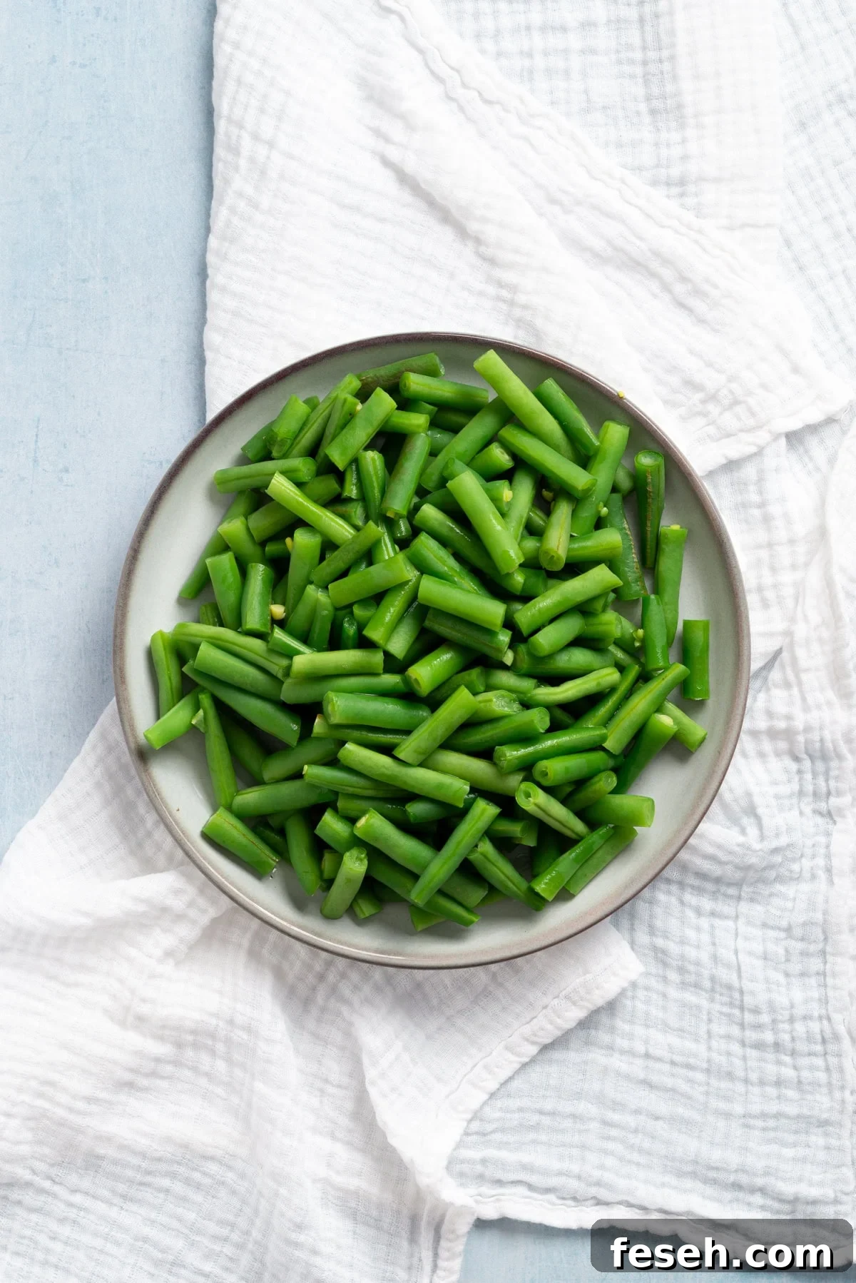 An overhead image of boiled Indian stiry fry green beans.