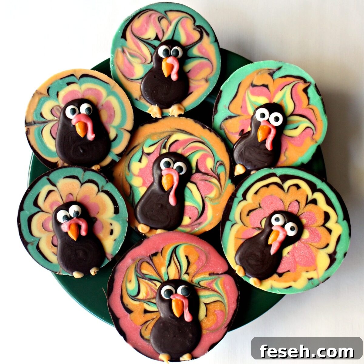 Colorful Chocolate Bark Turkey discs on a serving platter.
