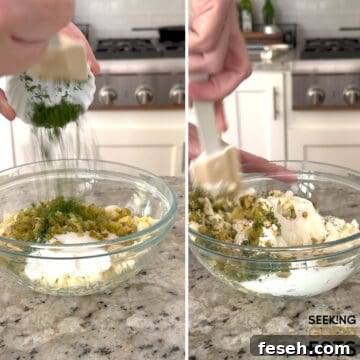 Mixing together all ingredients to make egg salad with dill pickles in a clear mixing bowl.