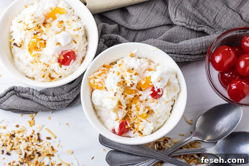 small bowl of fruit salad topped with toasted coconut