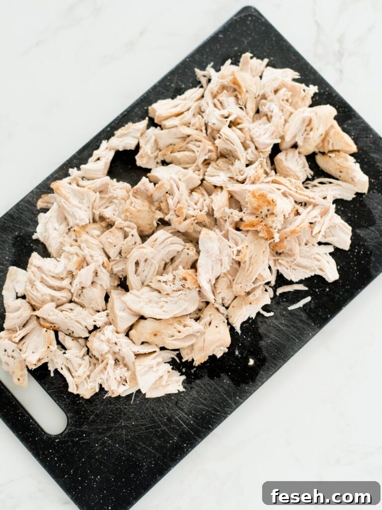 chopped chicken on a cutting board