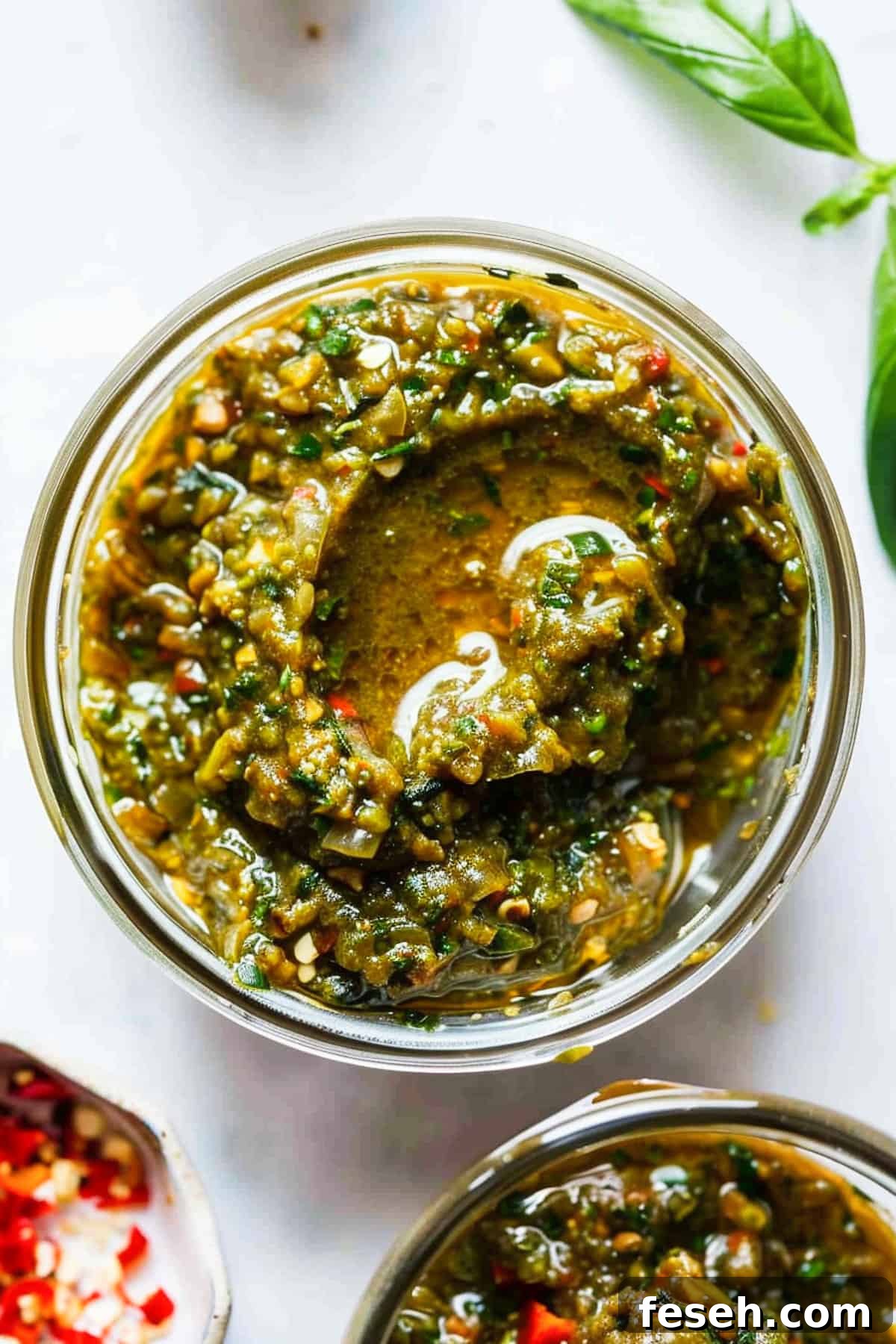 Homemade Thai green curry paste in a jar.