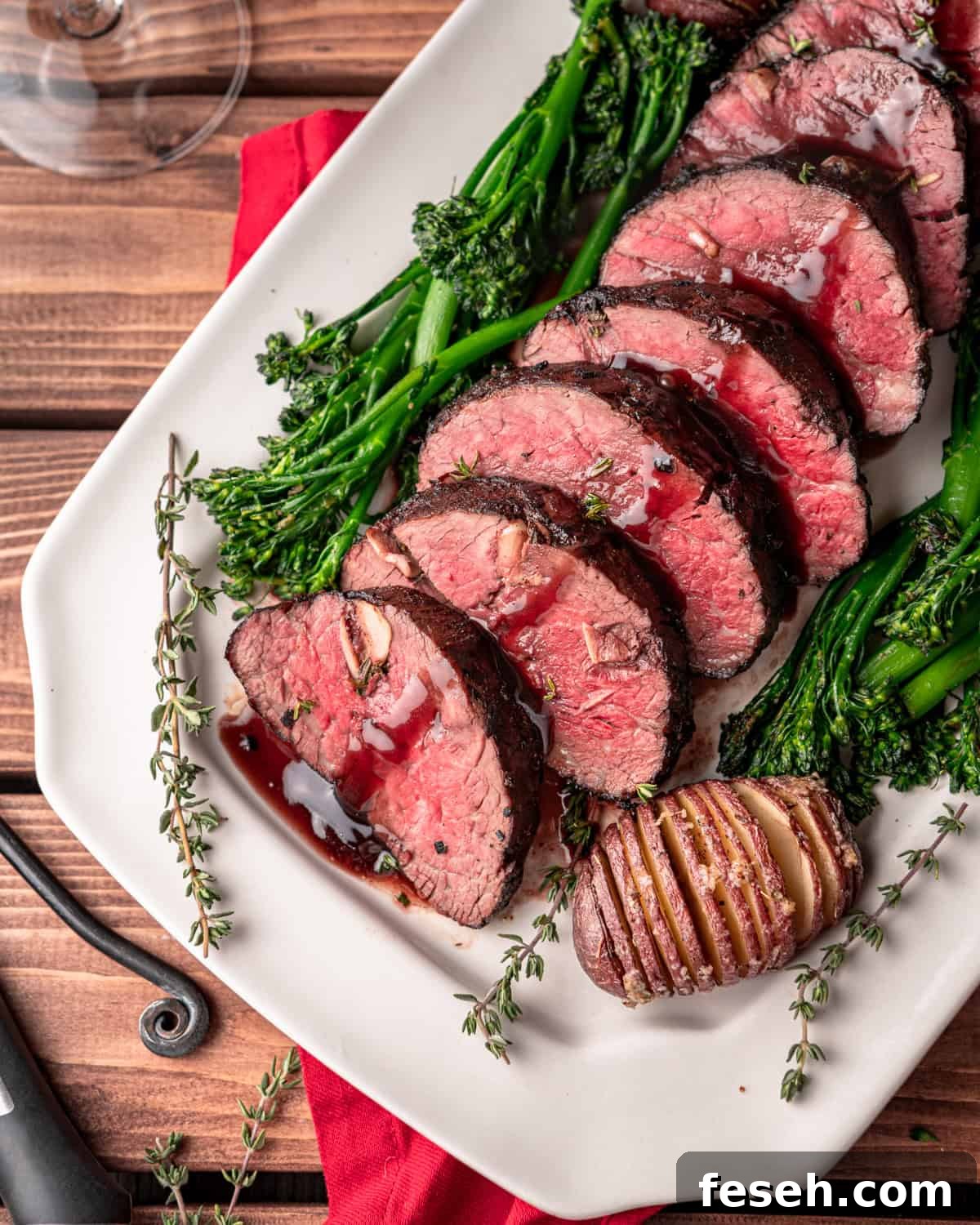 Garlic Studded Beef Tenderloin Roast with Red Wine Sauce
