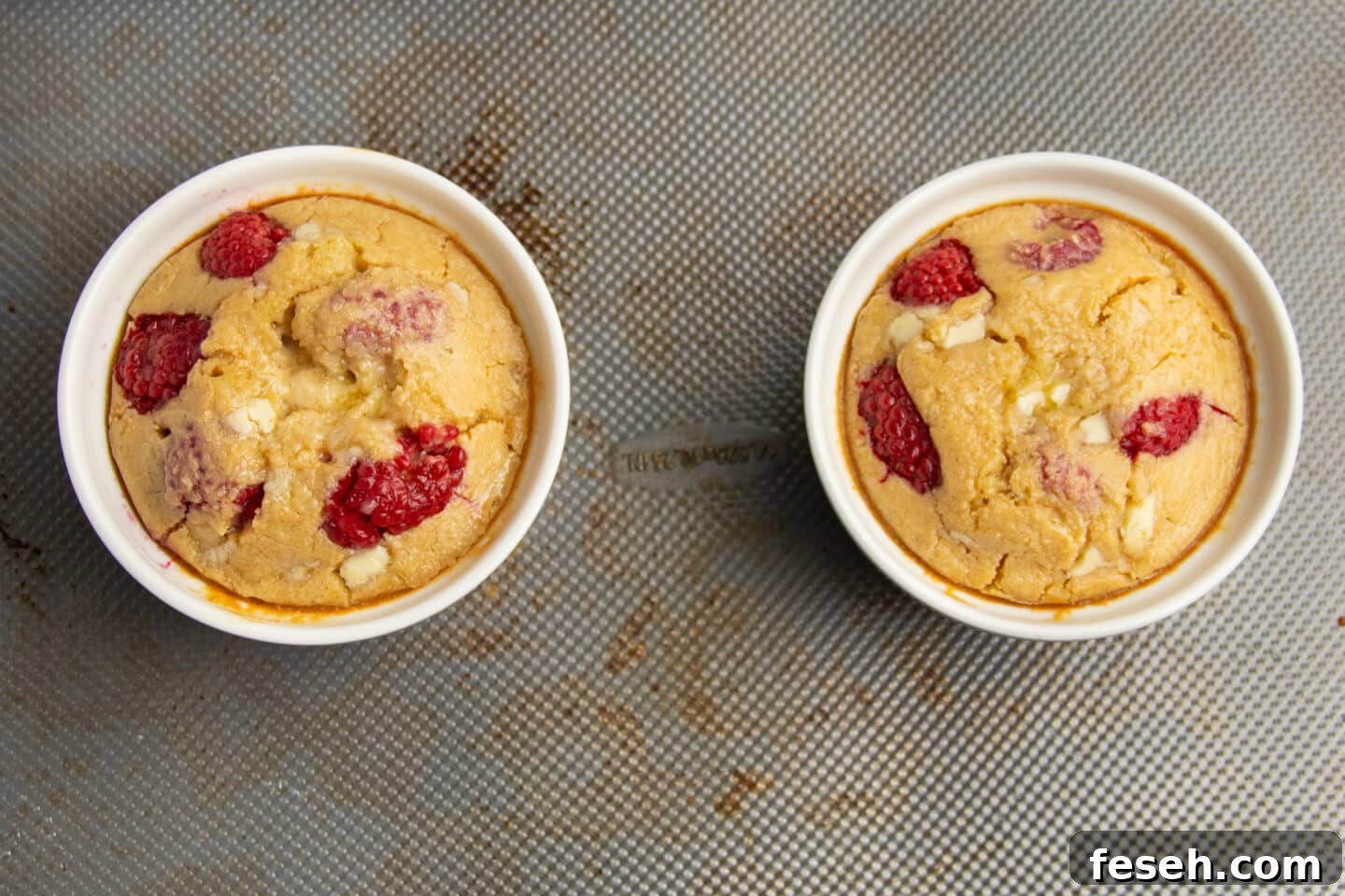 This is a picture of the ramekins filled with with baked oats after baking.