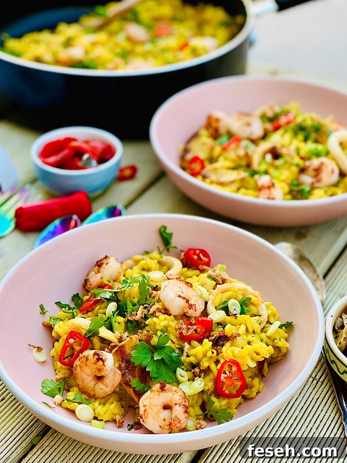 Pork and seafood risotto with turmeric and long pepper
