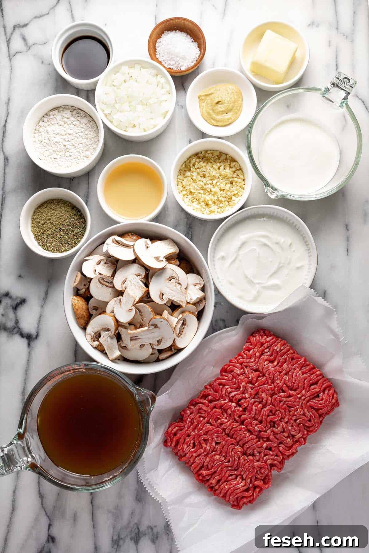 Bowls of ingredients to make ground beef stroganoff. 