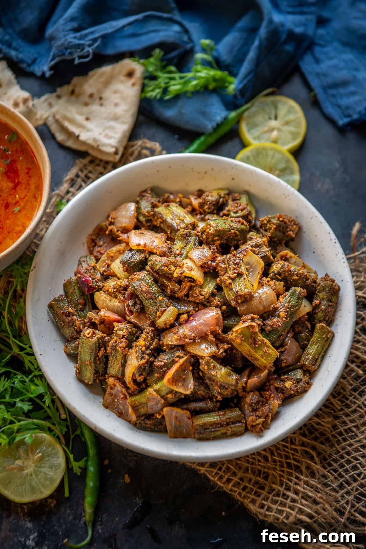 Besan bhindi served in a bowl.