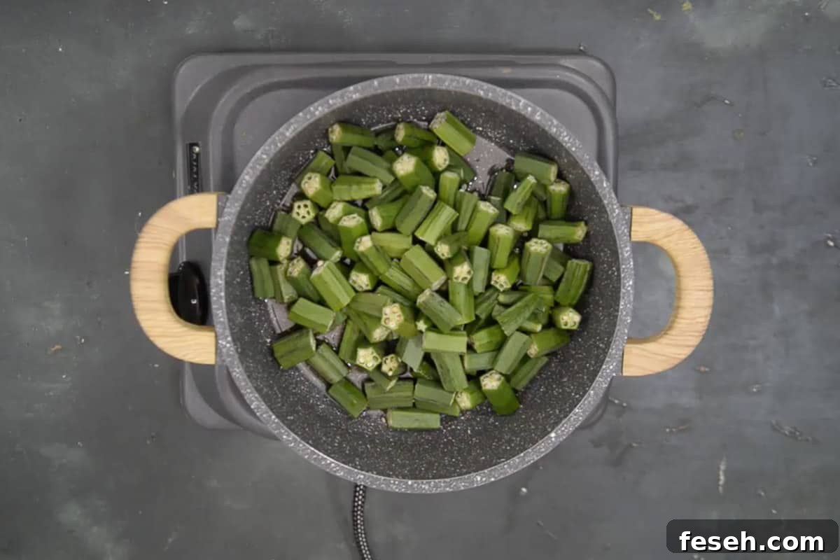 Bhindi added in the pan.