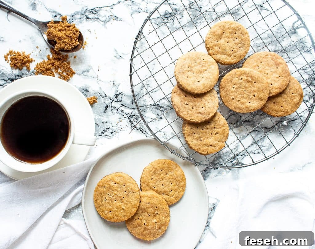 brown sugar shortbread cookies on a wire rack and then some on a plate, with a cup of coffee