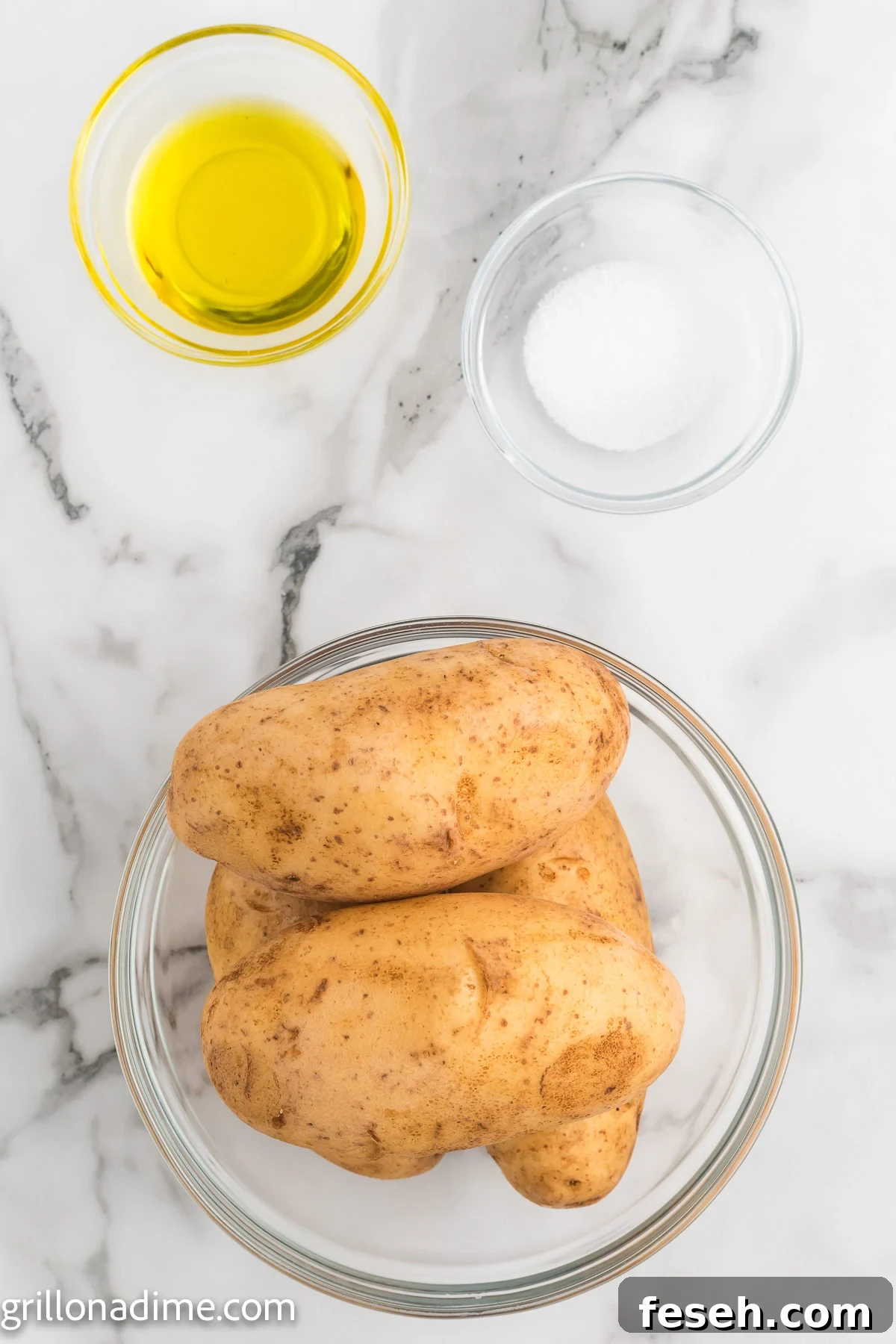 Oil, salt and baked potato in a bowl