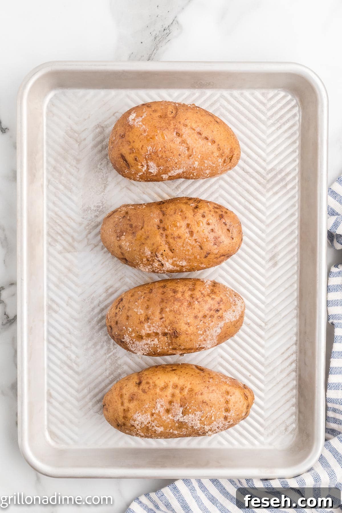 Baked Potatoes on a baking sheet
