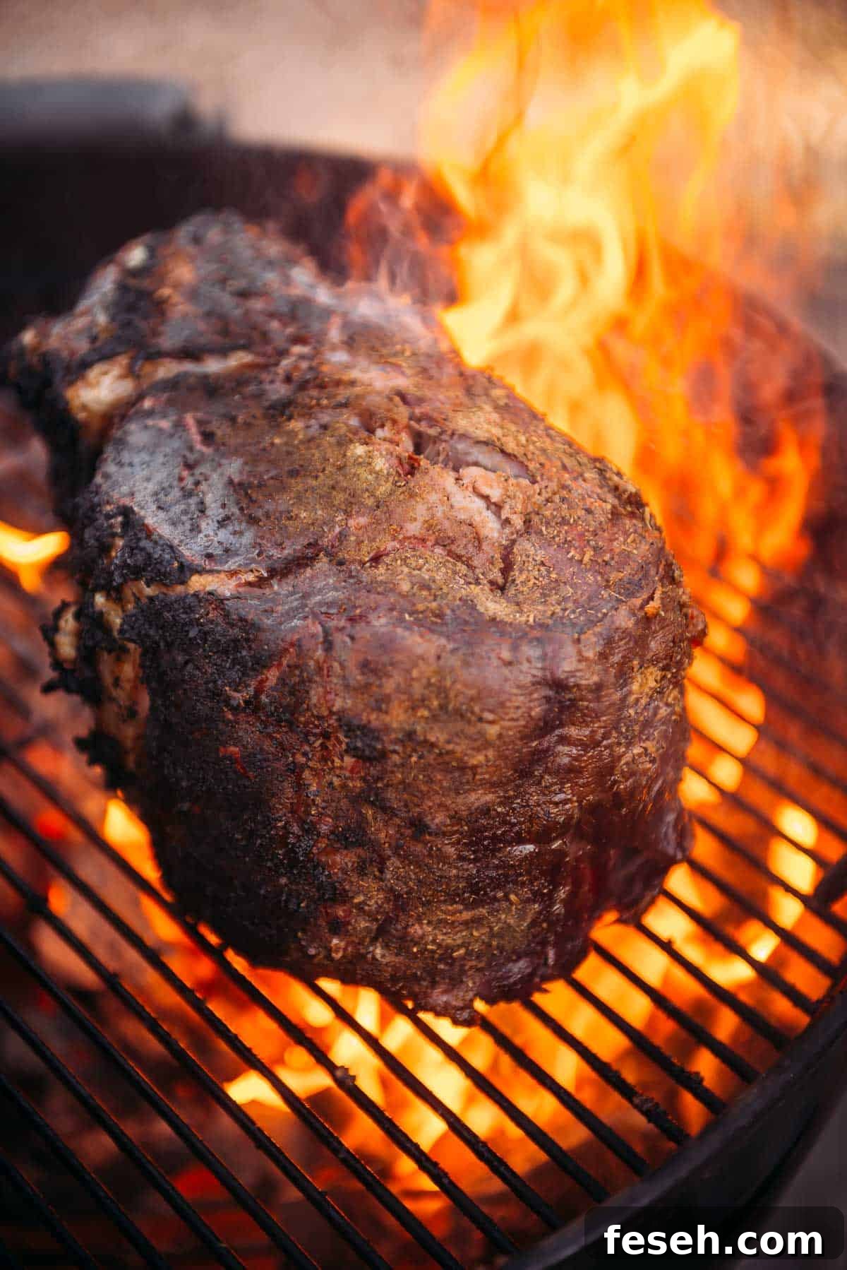 Perfect Grilled Prime Rib Recipe for Juicy, Flavorful Results 9 An example of a flare up; a prime rib on a grill with lots flames on it.