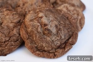 Nutella Cookies are thick and chewy cookies with Nutella baked into the batter and extra Nutella swirled throughout.