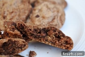 Nutella Cookies are thick and chewy cookies with Nutella baked into the batter and extra Nutella swirled throughout.
