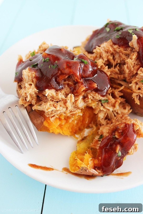 3-Ingredient BBQ Chicken Stuffed Sweet Potatoes – Tender sweet potatoes stuffed with shredded BBQ chicken make the most mouthwatering meal! Just 3 ingredients and 30 minutes.