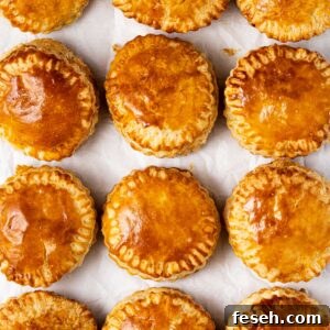 Rows of baked Pate Chaud on a tray.