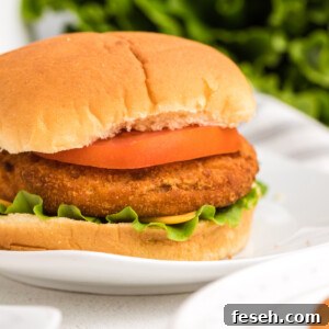 Fully cooked sandwich made with frozen chicken patties in the air fryer.