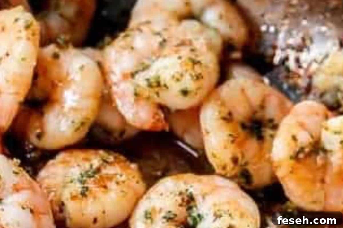  Lower heat, sprinkle in the parsley, and toss everything together for another 2 minutes until the shrimp are coated