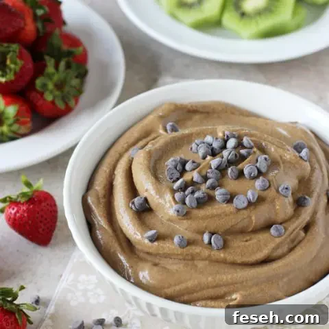Recipe for healthy chocolate fruit dip! Creamy and perfect for dipping! Made with coconut milk, maple syrup, cocoa powder and avocado!