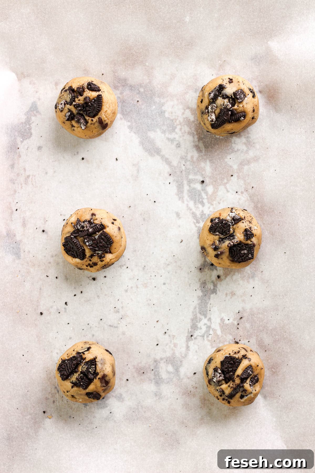 Scooped cookie dough on tray