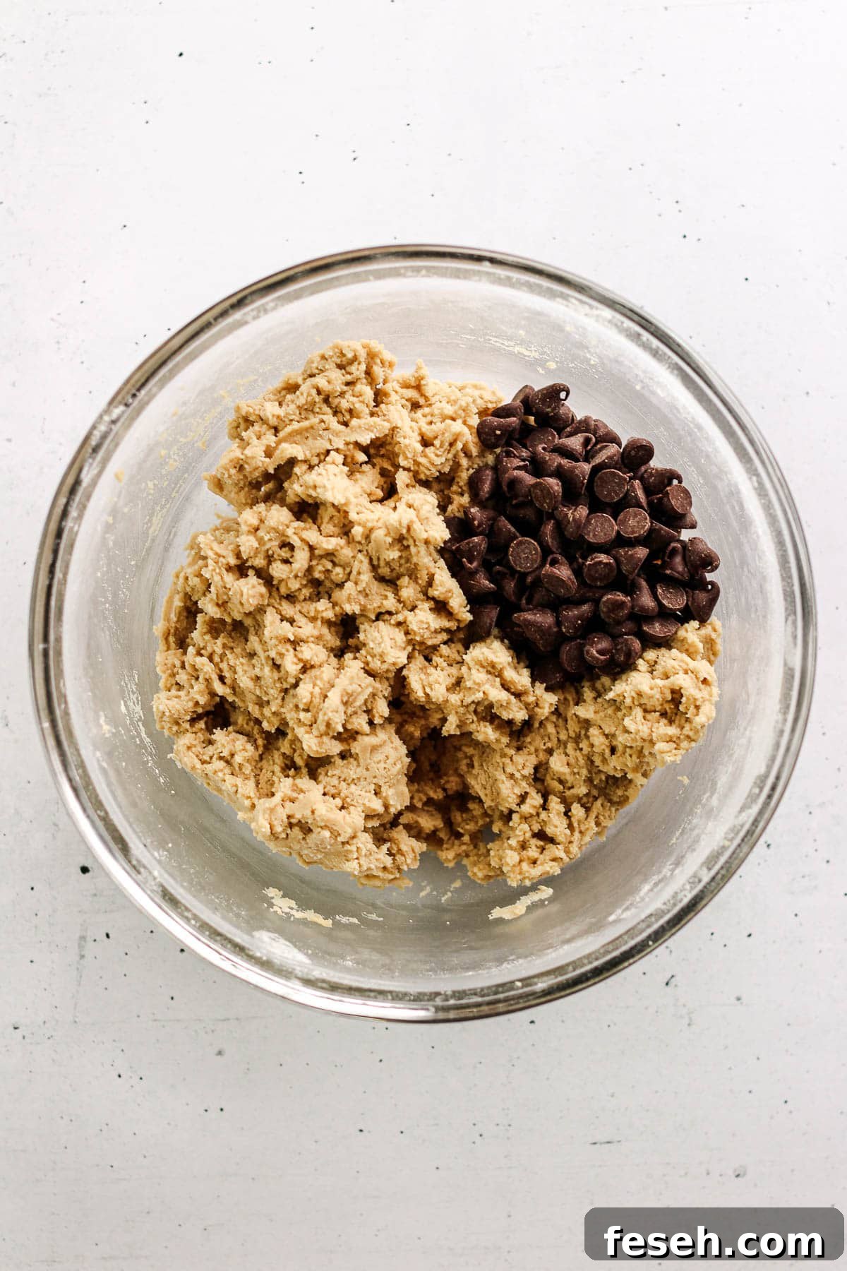 Adding chocolate chips