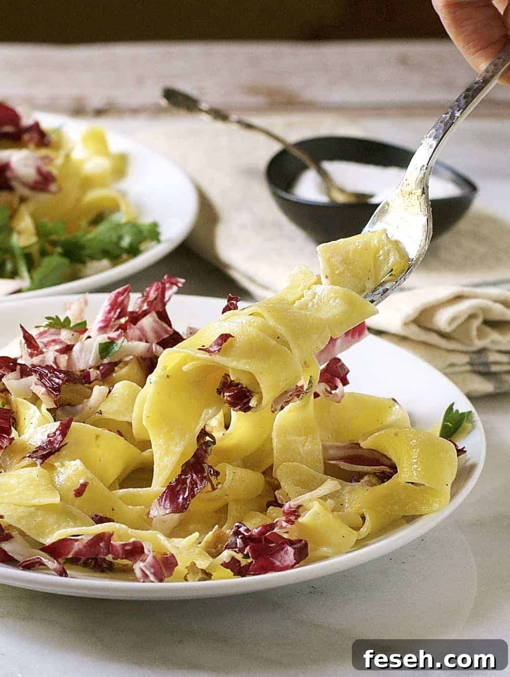 a-bite-of-creamy-pappardelle-with-radicchio