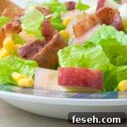 This easy apple and bacon salad recipe is the perfect combination of sweet and salty with a nice combination of delicious flavors! This recipe spices up regular salad and is so much tastier than plain lettuce and dressing! It's easy to make with just a few minutes' work and is the perfect side for chicken, beef or pork dishes!