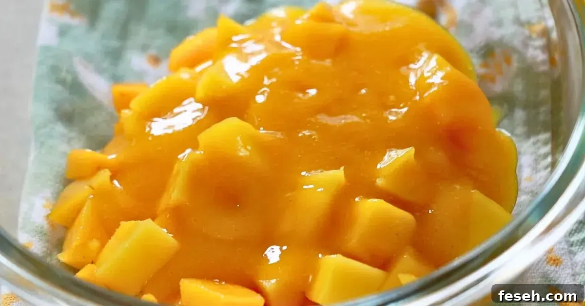 fresh mango and pureed mango in a bowl